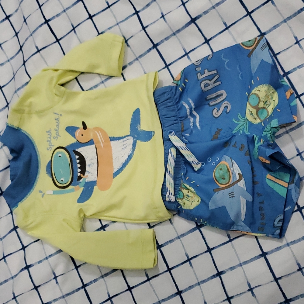 Newborn Carter's Boys swim shorts and long sleeve